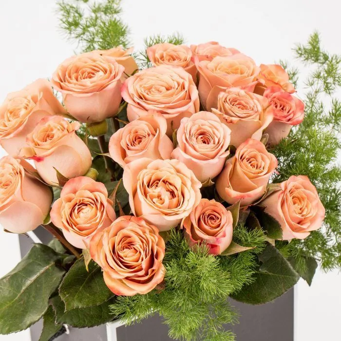 Apricot and peach garden roses with soft foliage — a custom Flowers for All arrangement